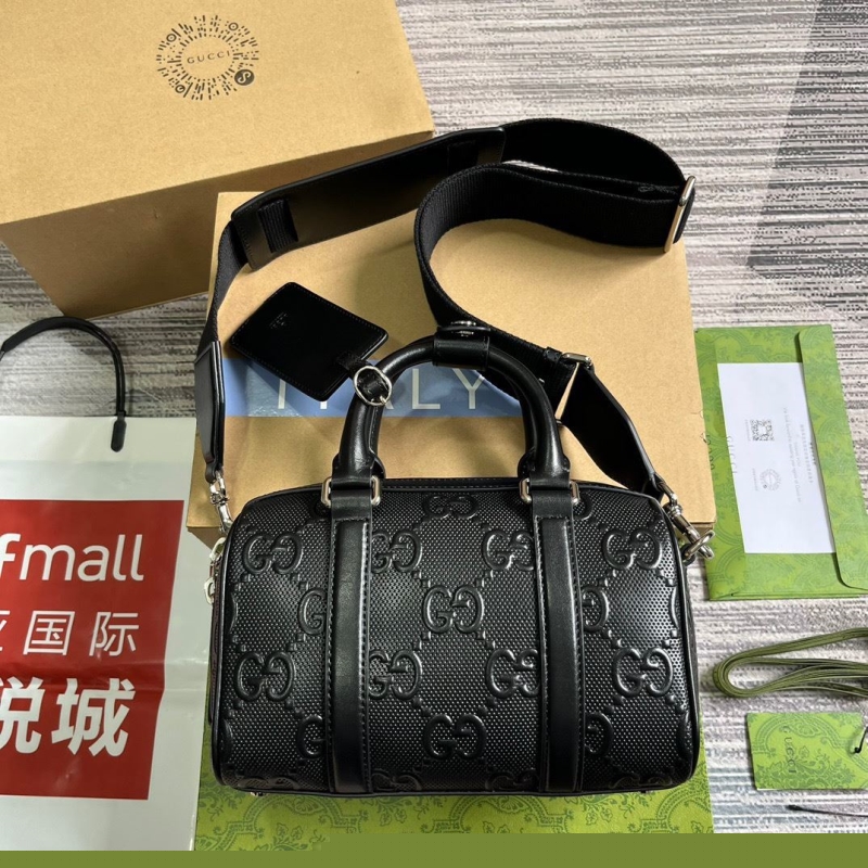 G*u*i top handle bags